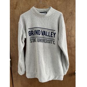 Grand Valley State University Woolly Threads sweatshirt.